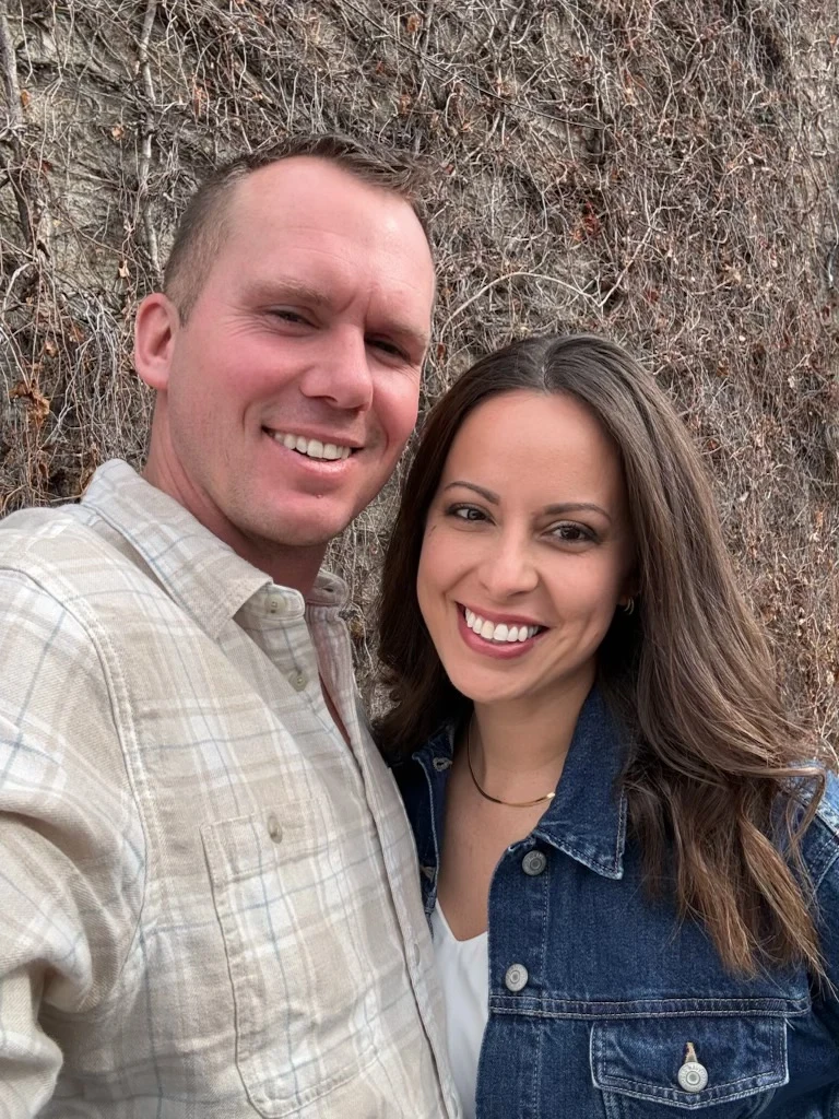 Connie and Ben smiling together outdoors